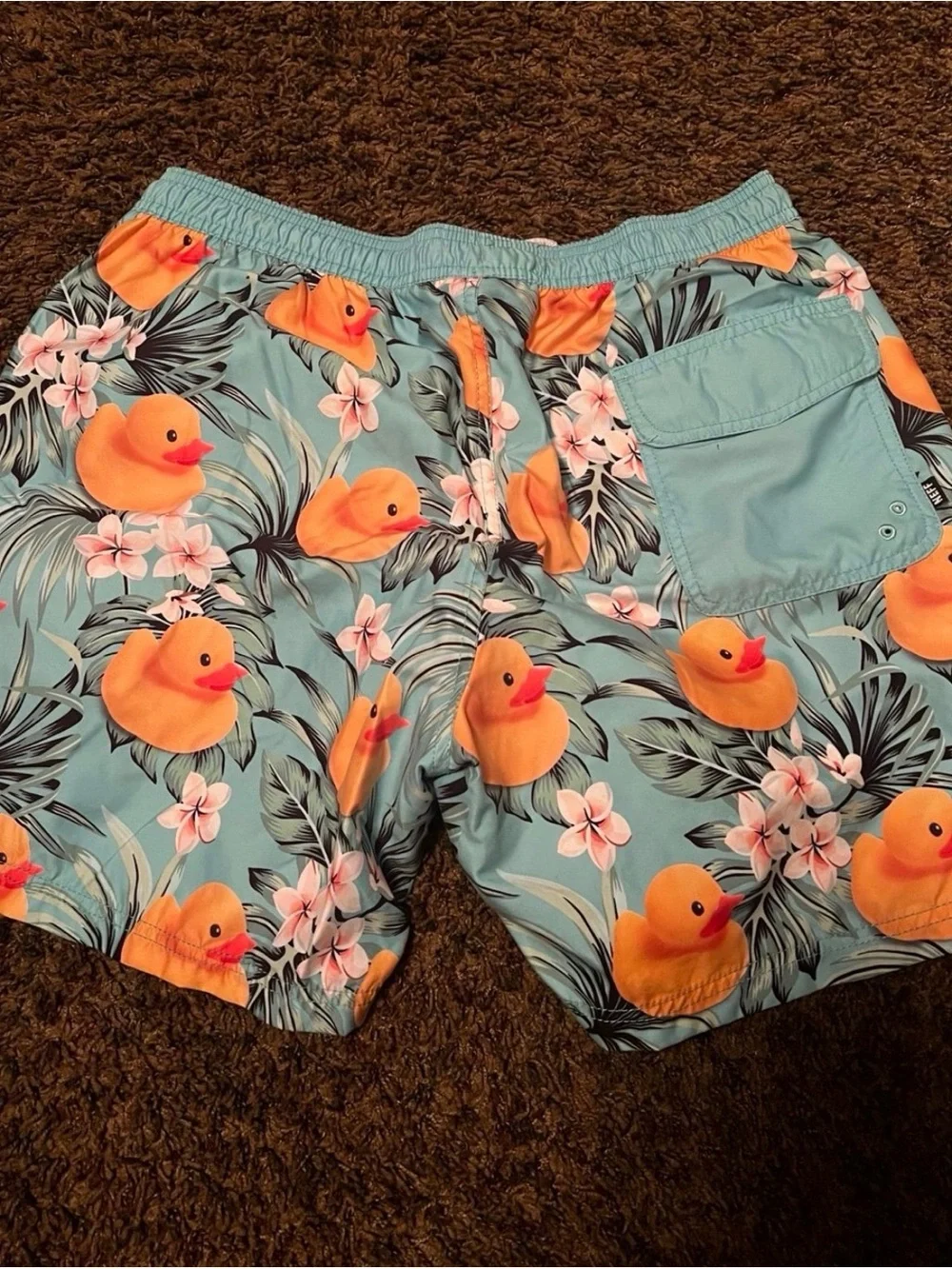 Neff Men’s Light Blue Swim Trunks with Orange Rubber Duck Print